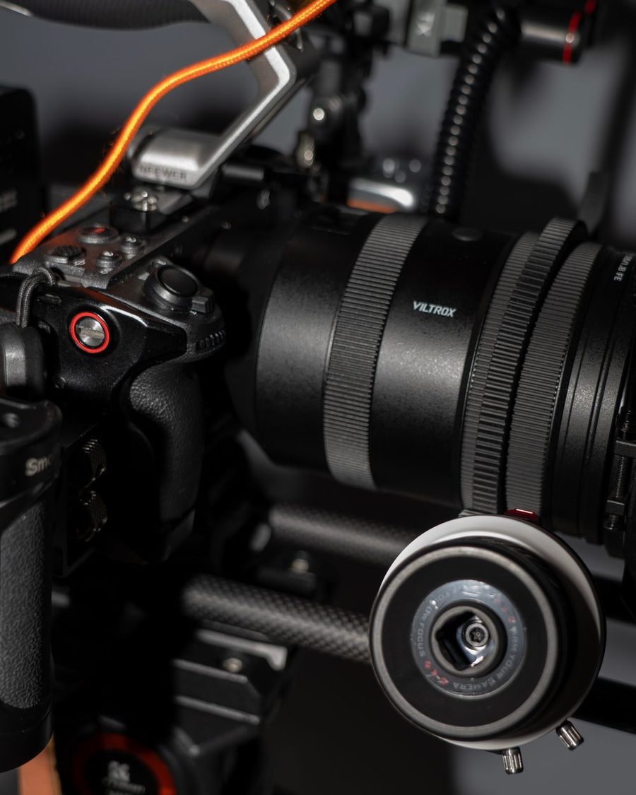 A cinema camera rig with a follow focus and monitor